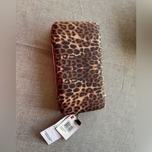 NWT hard sided wallet.